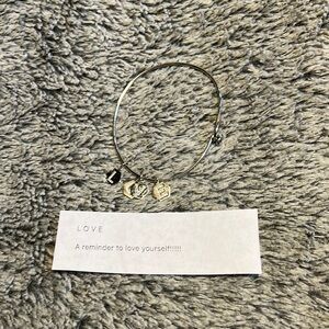 Core sliver bracelet with charms that spell love! Brand new